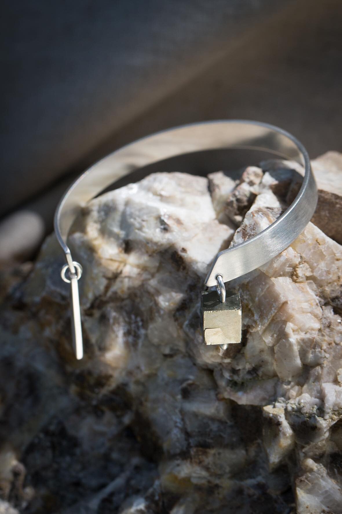 bracelet with pyrite and medium flat bar.jpg