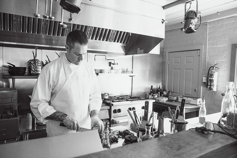 Sous Chef Josh preparing lunch at Canneti.