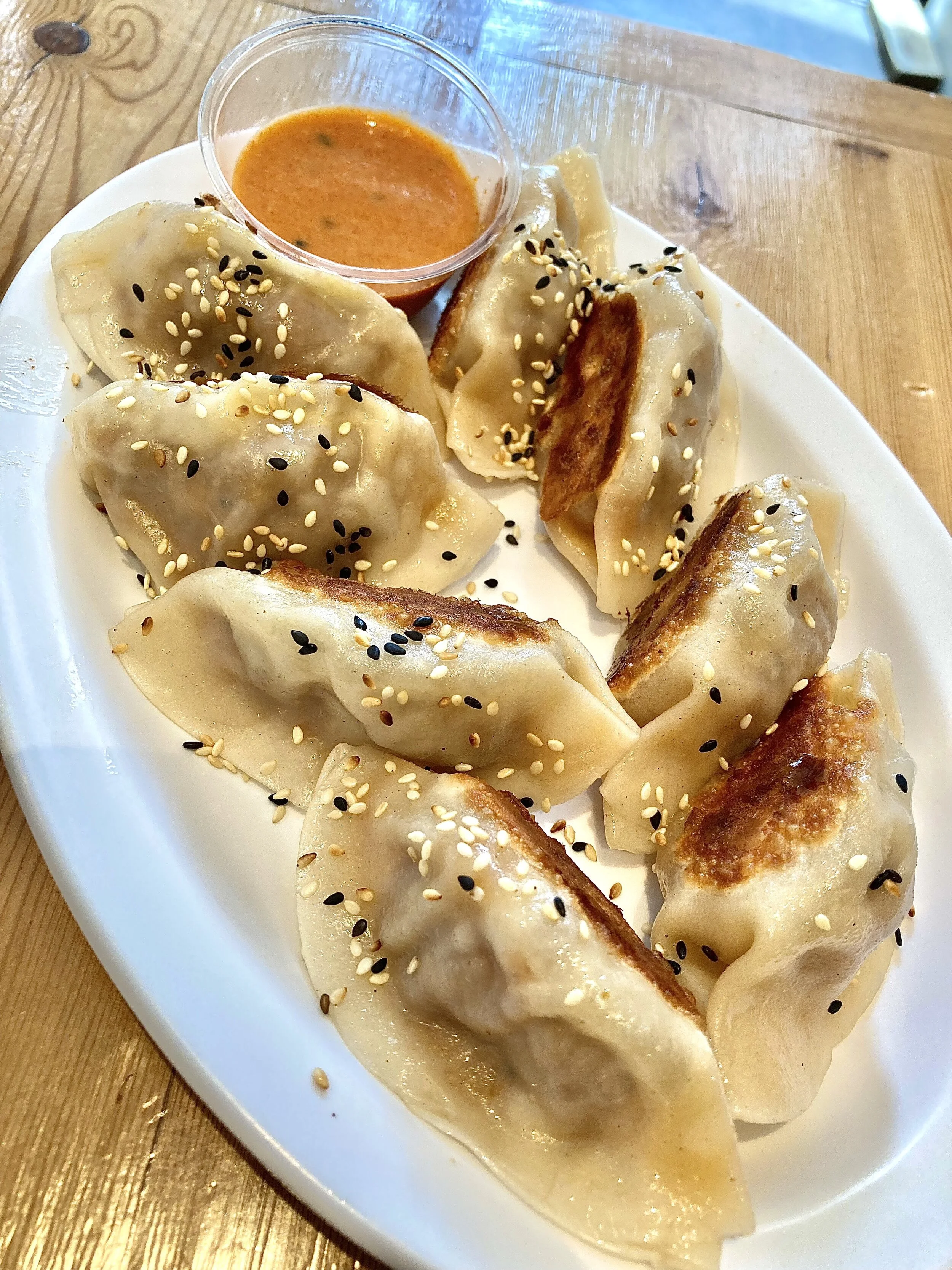 Emmy Burger Dumplings (emmy cheeseburger dumplings in collaboration with Pizza Loves Emily/Emmy Squared, dry-aged beef, Grafton cheddar, crushed pretzels, caramelized onions, and Emmy Sauce. Pan-fried only. (8 pieces) $16.45