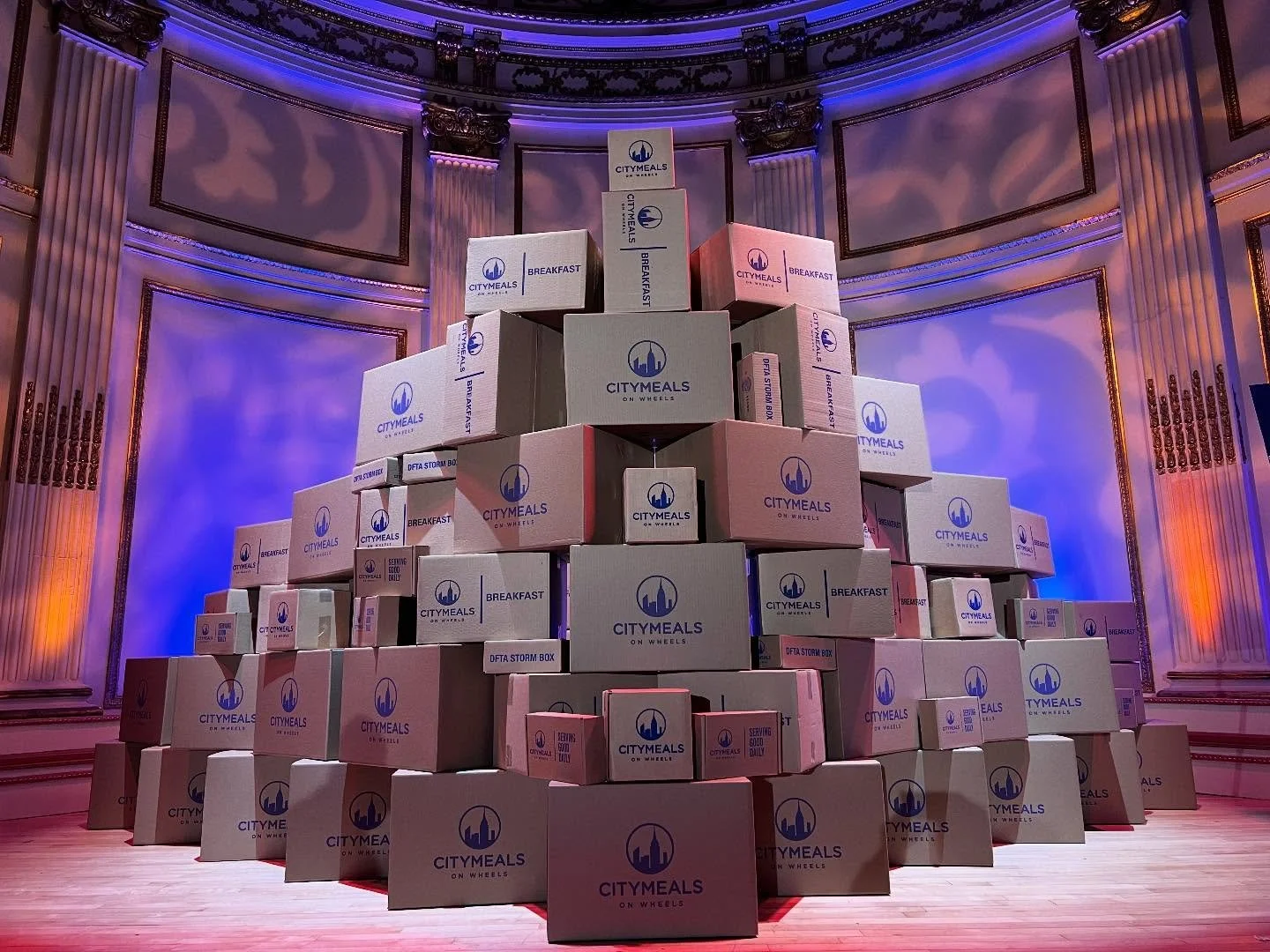 We were honored to partner with @citymeals for their Power Lunch at The Plaza Hotel. The stage was piled high with boxes&mdash;yet even this impressive display covers just one day&rsquo;s meals for the 400+ guests. A powerful reminder of how much mor