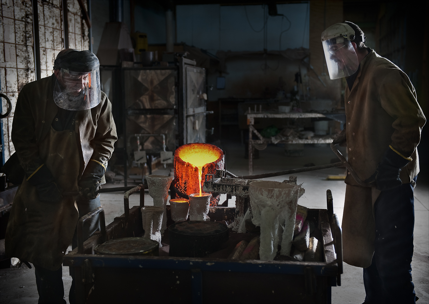 Cameron and Naz during a bronze pour at the Fundere Artist Foundry