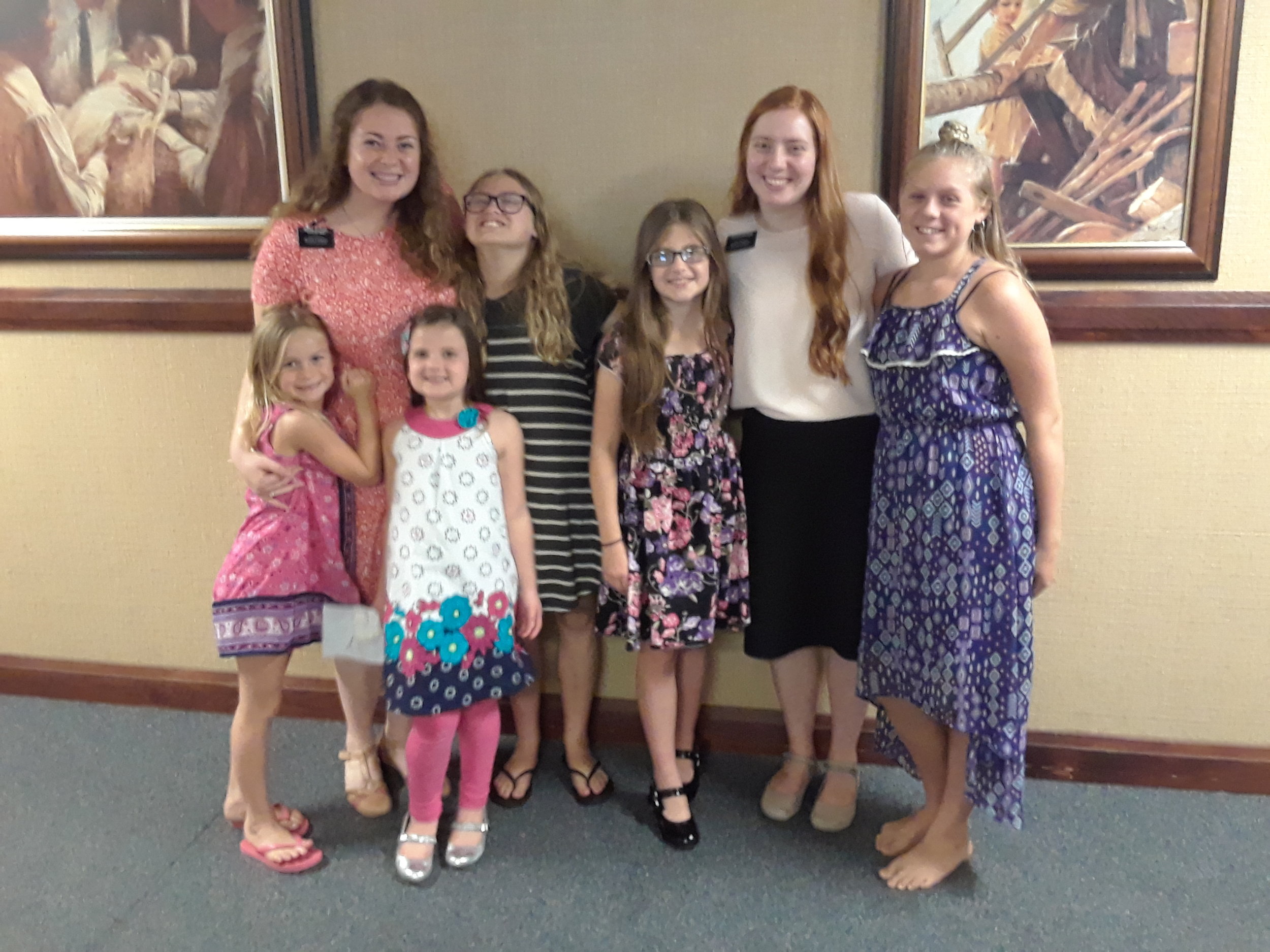 Marina and her sisters and friends!!! (She's in the grey striped dress)
