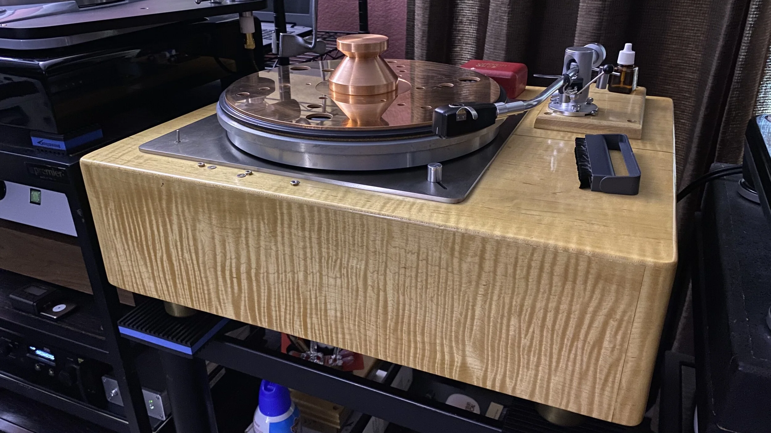  85 pound Lenco PTP4 build with Fidelity Research FR24 MKII tonearm and Ortofon SPU GE MKII cartridge retipped by Andy Kim with a line contact nude stylus instead of the original elliptical stylus. Tiger maple plinth with upgraded long bearing housin