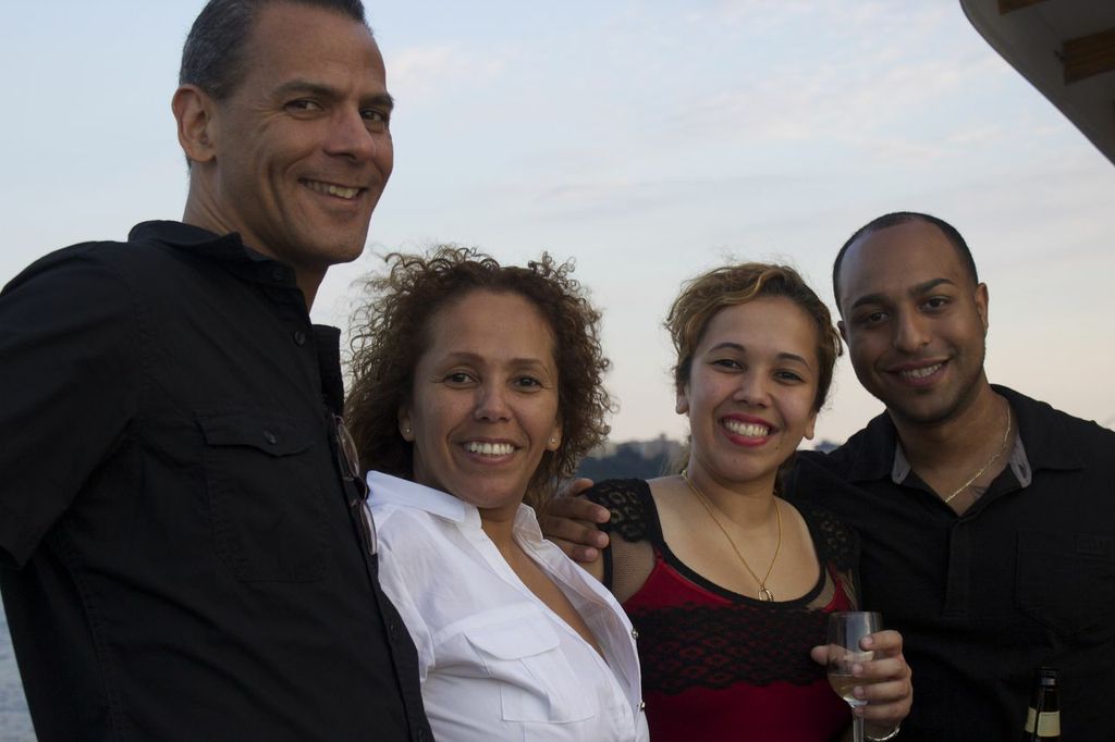 Bookkeeper Lourdes Sierra and husband Louis with paralegal Stephanie Carril and boyfriend Elijah. 