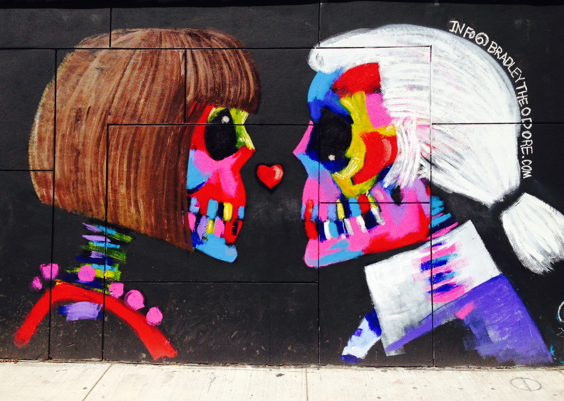 Anna and Karl (on the corner of Kenmare and Elizabeth in Soho) by artist Bradley Theodore , who says: "'Fashion allows people to become art[.}'” 