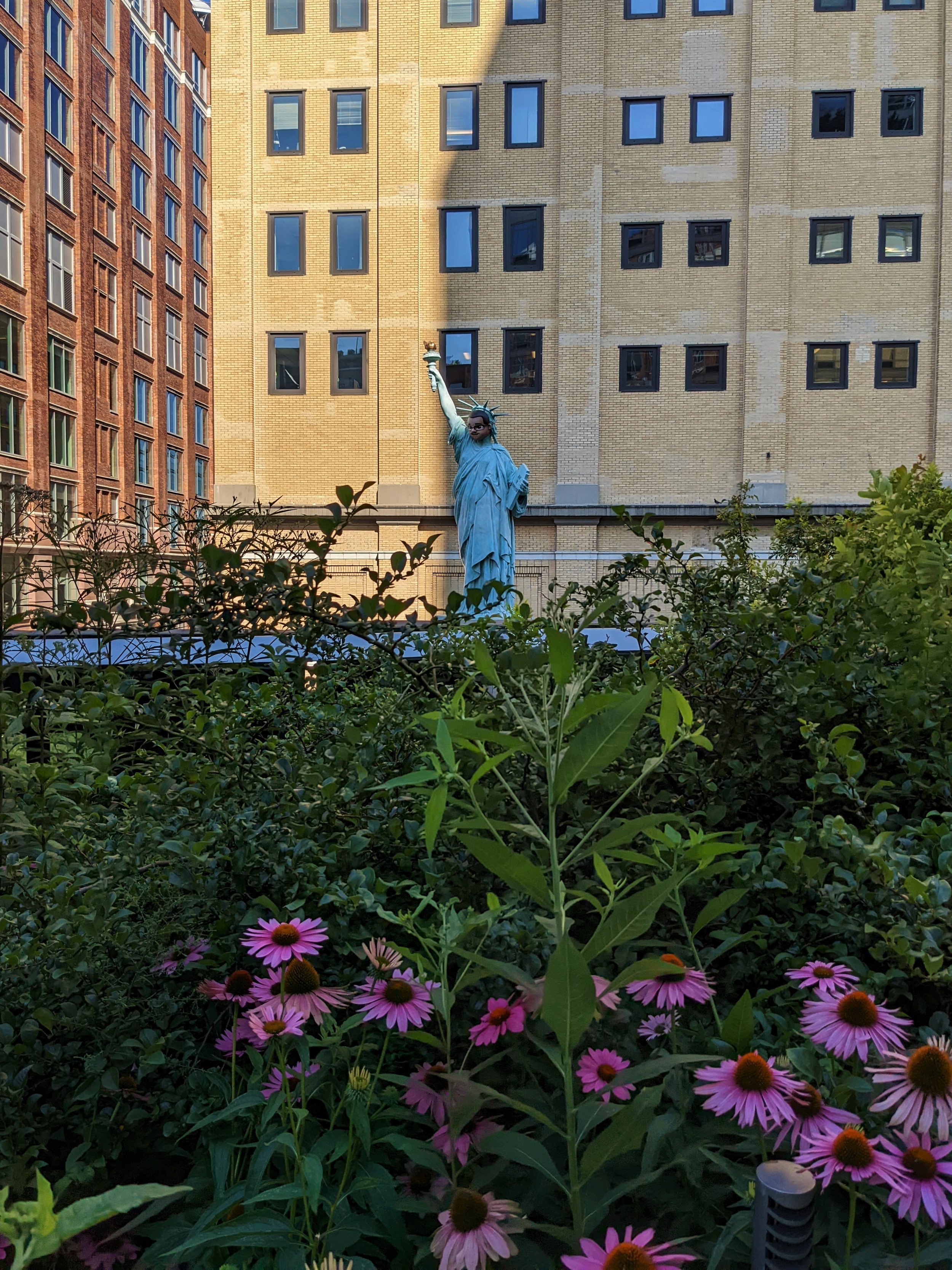 statue with flowers.jpg