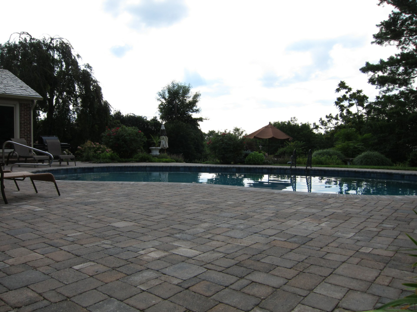 Tri-State project with Dublin Cobble paver deck in Sheffield Blend color range. Bullnose Paver Coping, Sable Blend. Mosaic waterline tile and Diamond Brite interior finish.