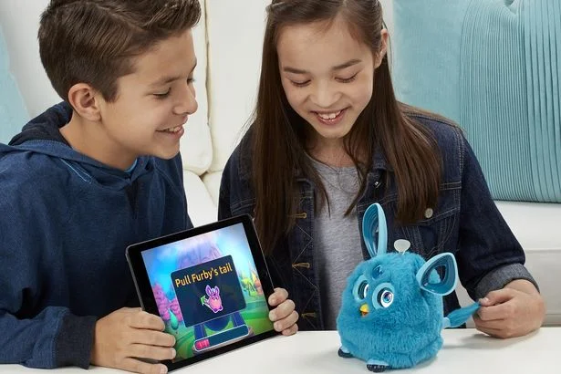 Furry Connect £99.00 Explore the Furby Connect World app to make the most of your cute companion With over 150 expressions, kids will never tire of Furby's expressive world. Get access fun games and videos, plus find even more ways you can play with Furby via the urby Connect World app.
