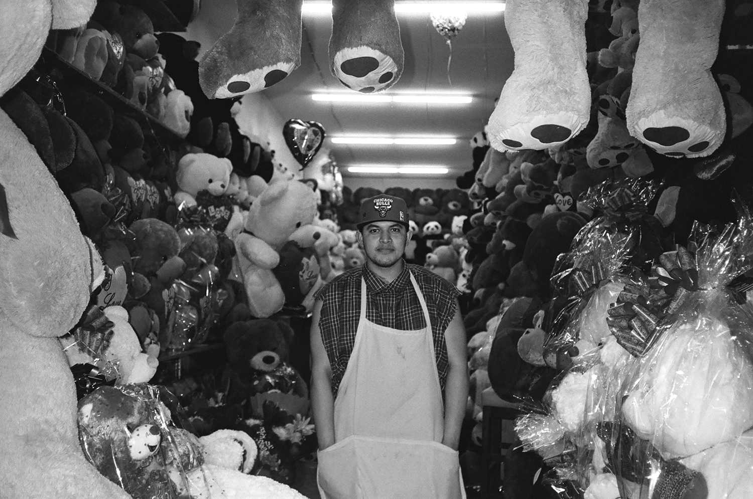 Man with teddy bears in the SFV February.jpg