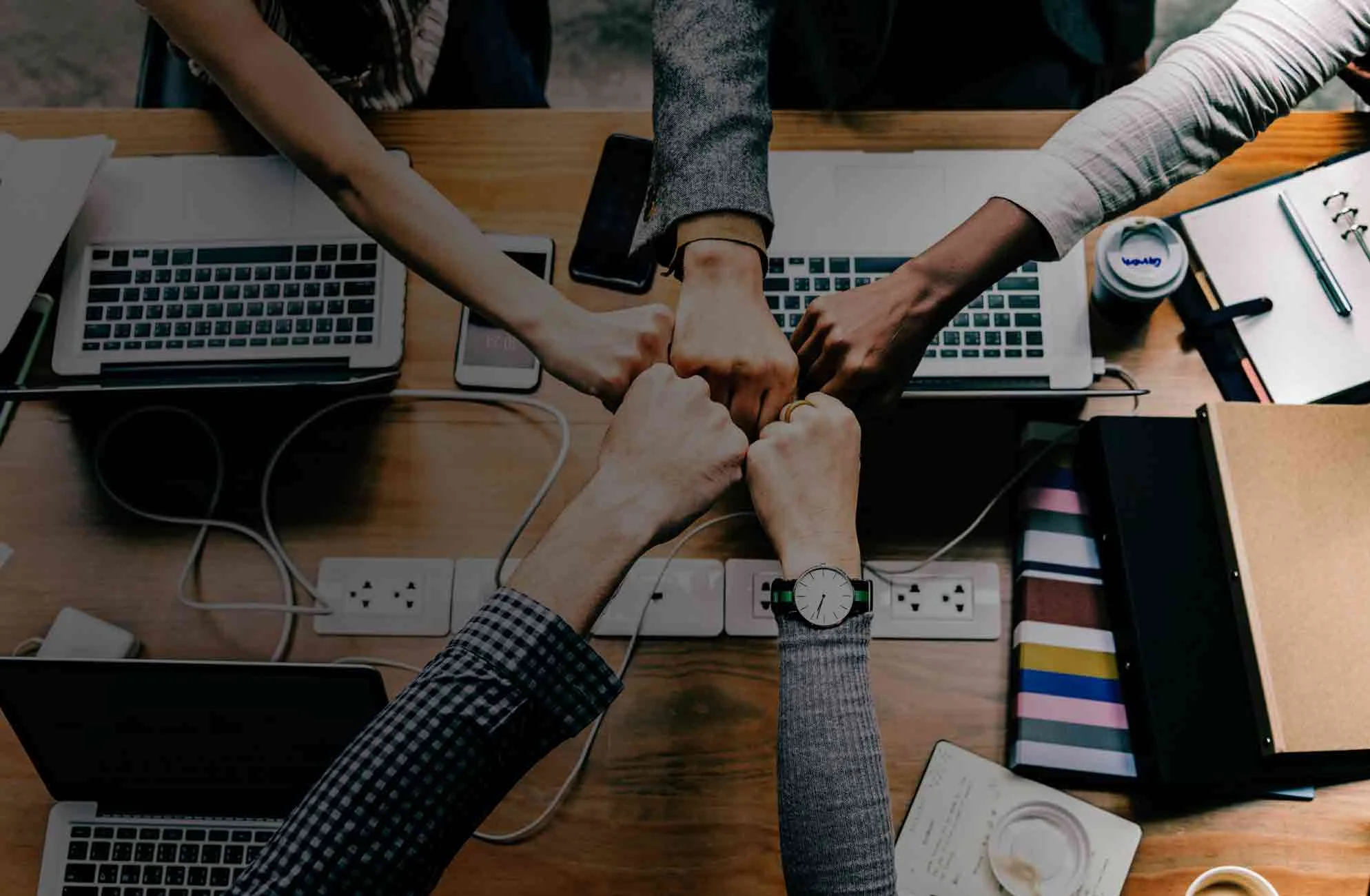 teamwork-fist-bump-gradient.jpg