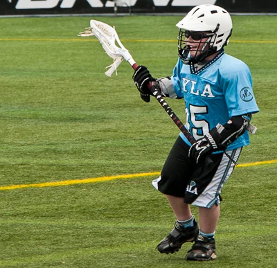 Young Lacrosse Player © Lauren Peeler Brice