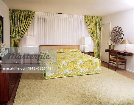 846-03164724em-1970s-BEDROOM-WITH-GREEN-AND-YELLOW-FLOWERED-BEDSPREAD-AND-DRAPES.jpg