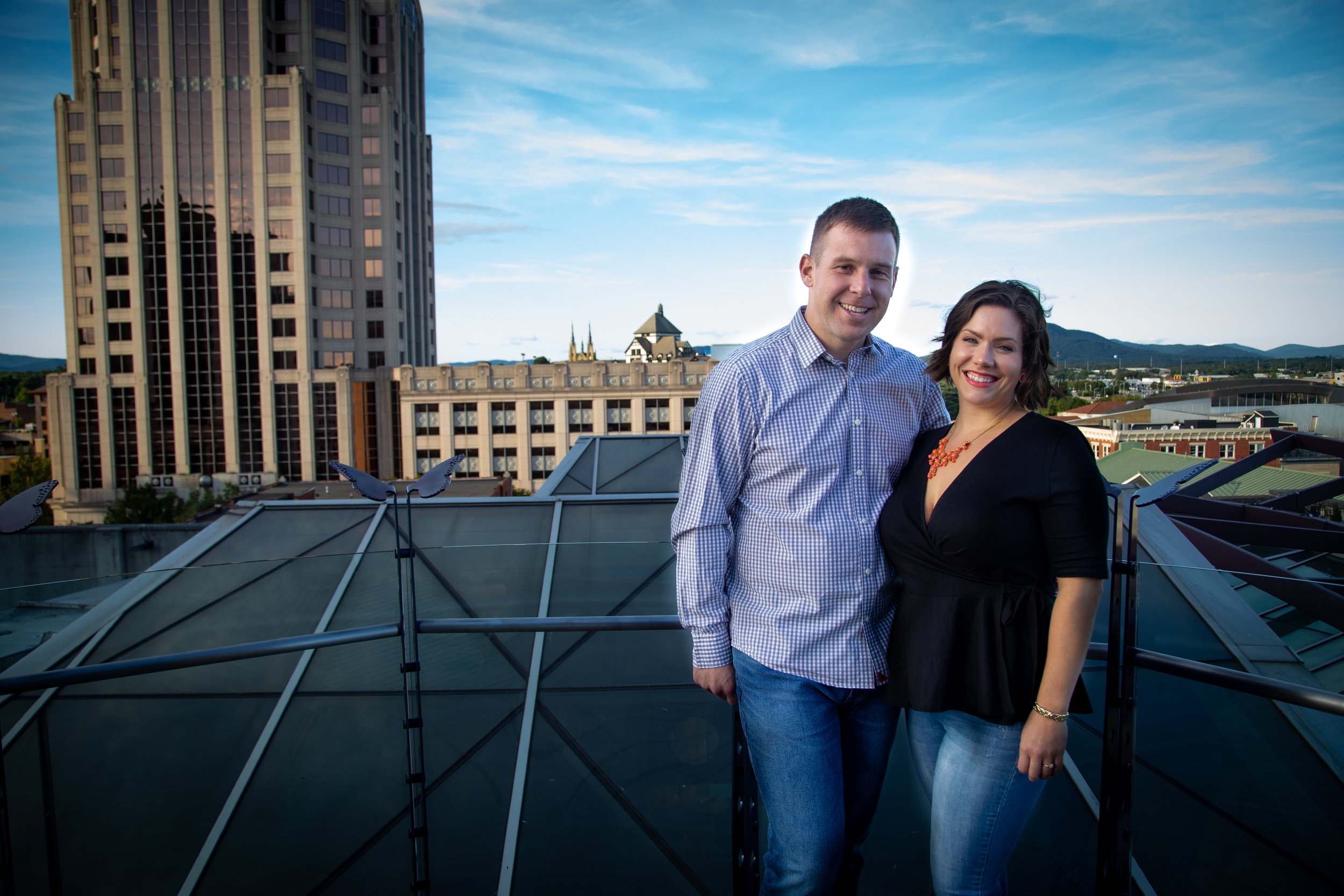 center-in-the-square-downtown-roanoke-urban-rooftop-engagment-wedding-wells-fargo-building-mountains-couple-love-engaged