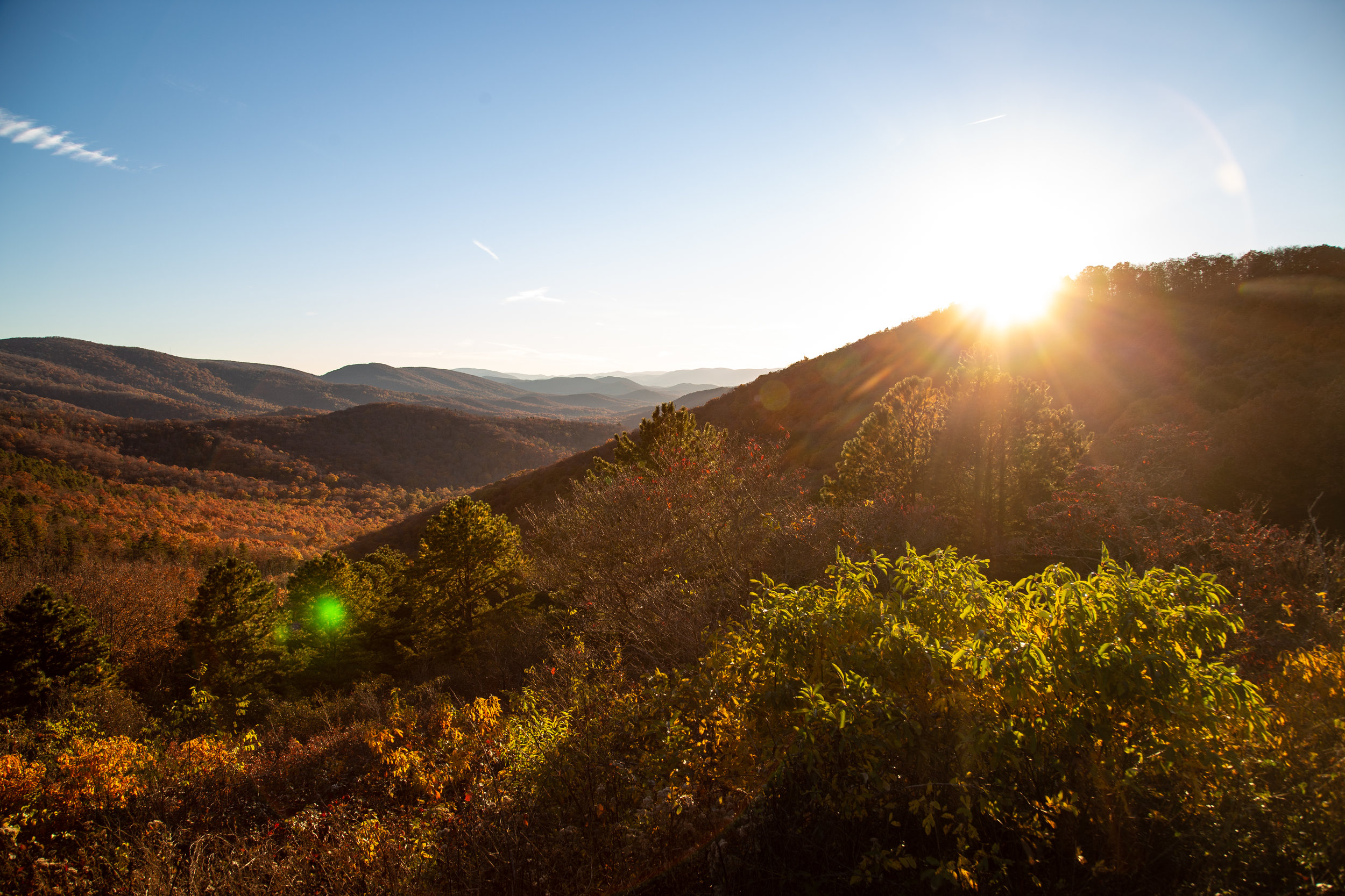 Shenandoah-National-Park-blue-ridge-parkway-day-mountains-afternoon-haze-layers-distance-texture-trees-fall-sunset-evening-sunflare-sun-flare