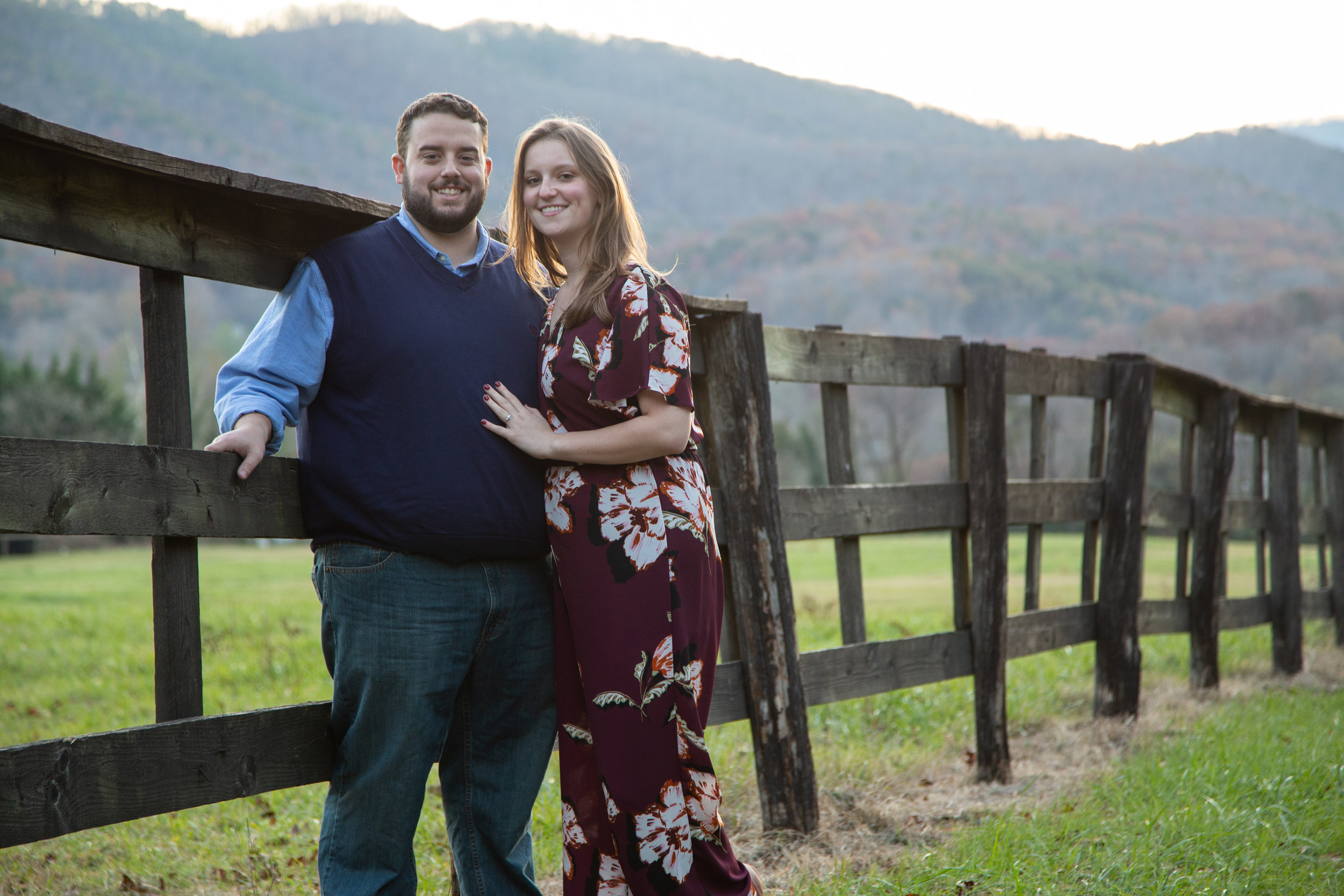 Blue-Ridge-Parkway-Fall-Sunset-couple-engaged-mountains-love-together-fence-roanoke-engaged-beauty-virginia-photography-nature-candid-wide