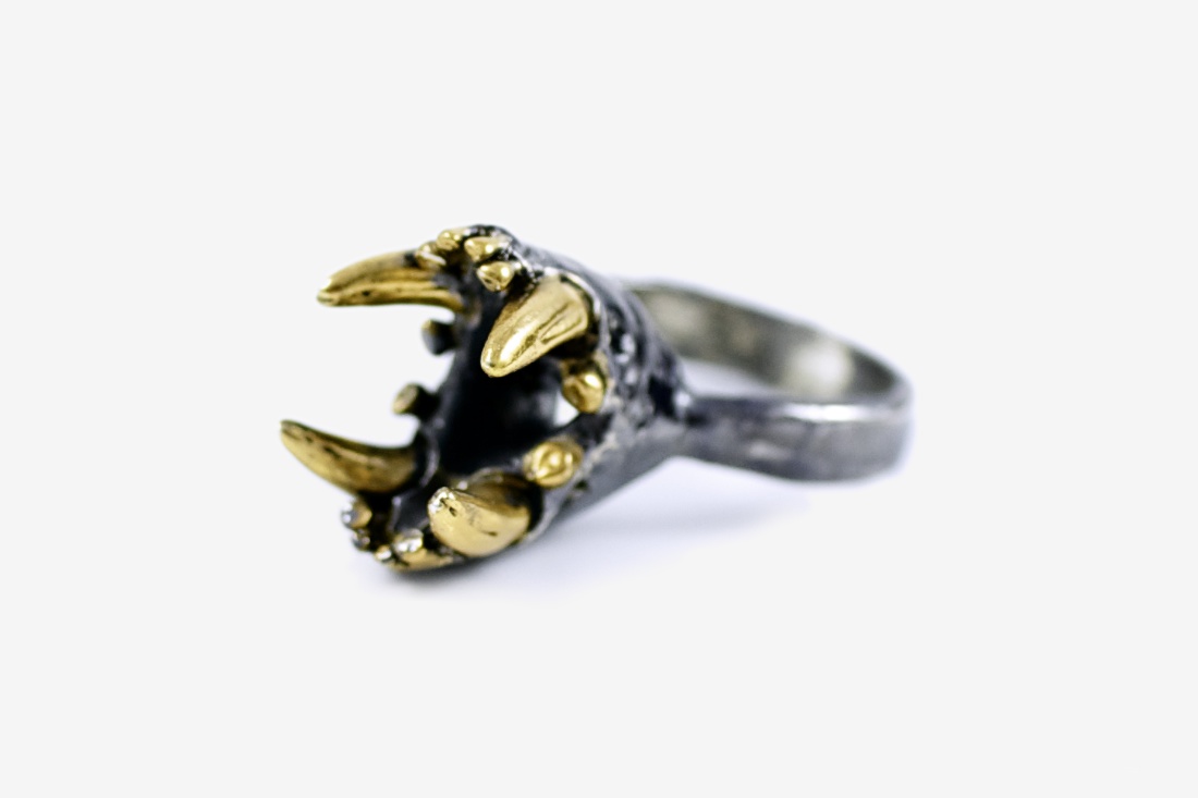 small jaws ring with gold detailing