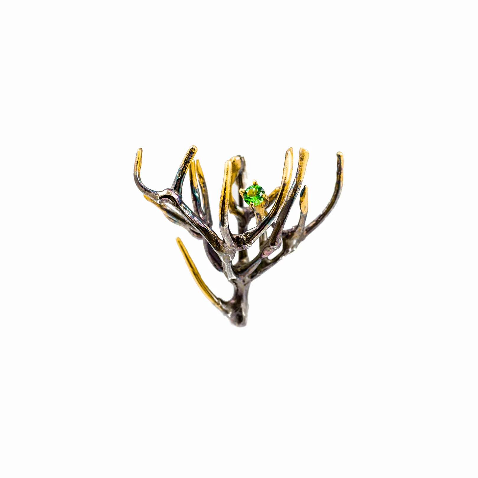 Unfolding Brooch | Sterling silver, tsavorite.