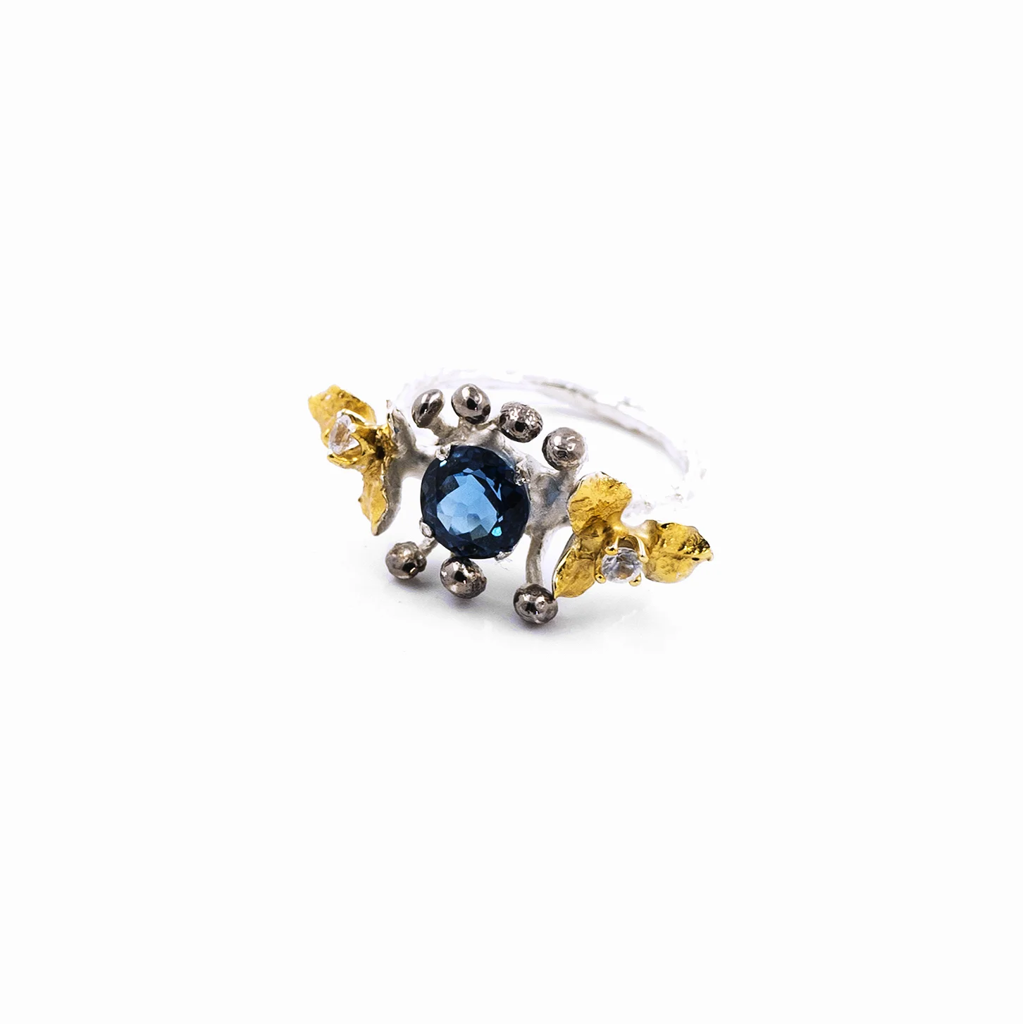 November Ring | Sterling silver, topaz, sapphires..