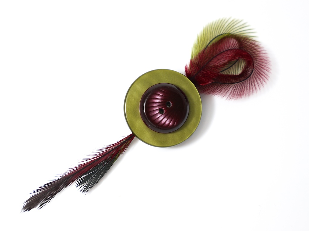 Buttons and feathers go together!