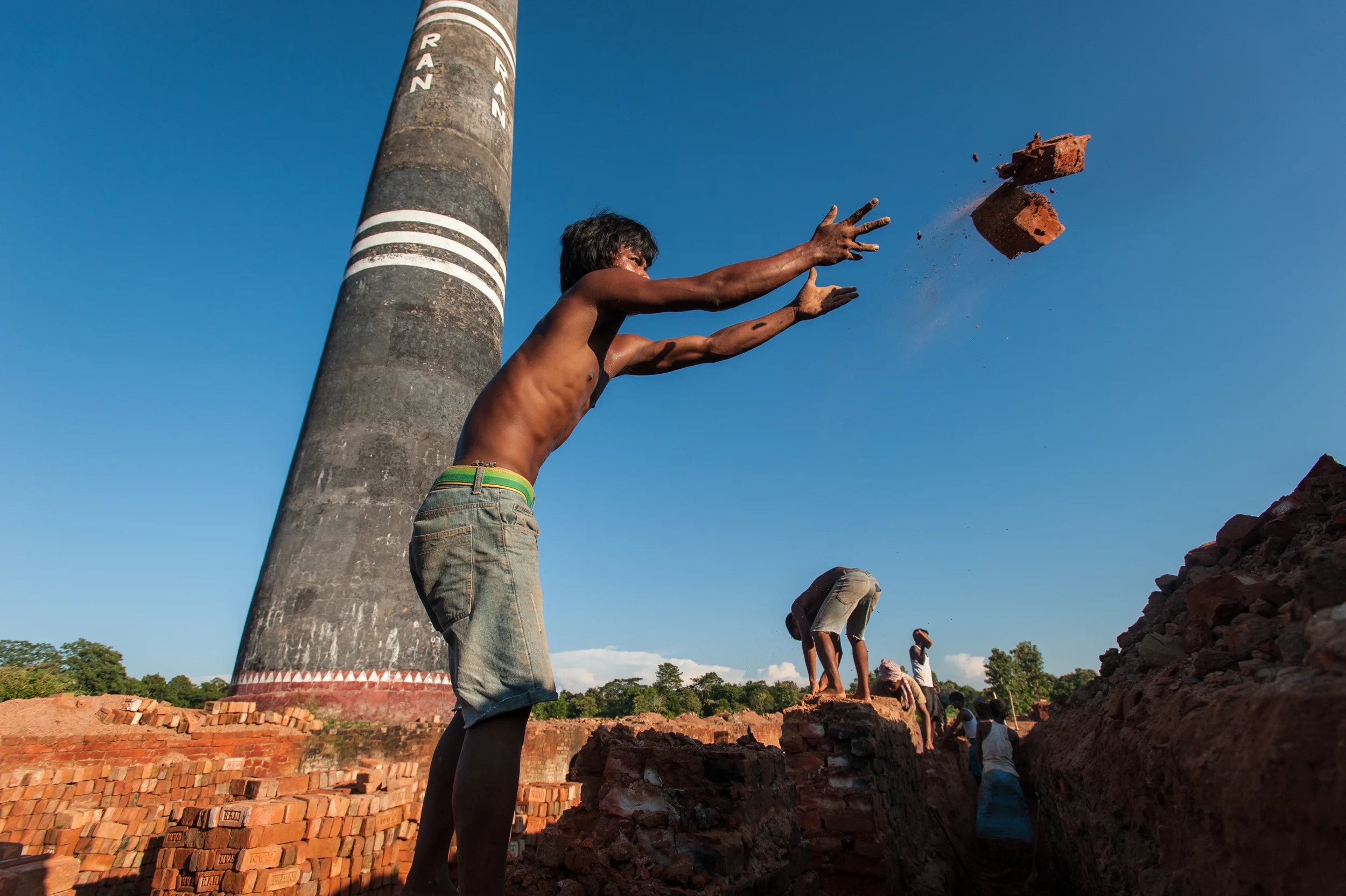 Bangladesh Clearing away broken bricks in a factory in the Chittagong Hill Tracts