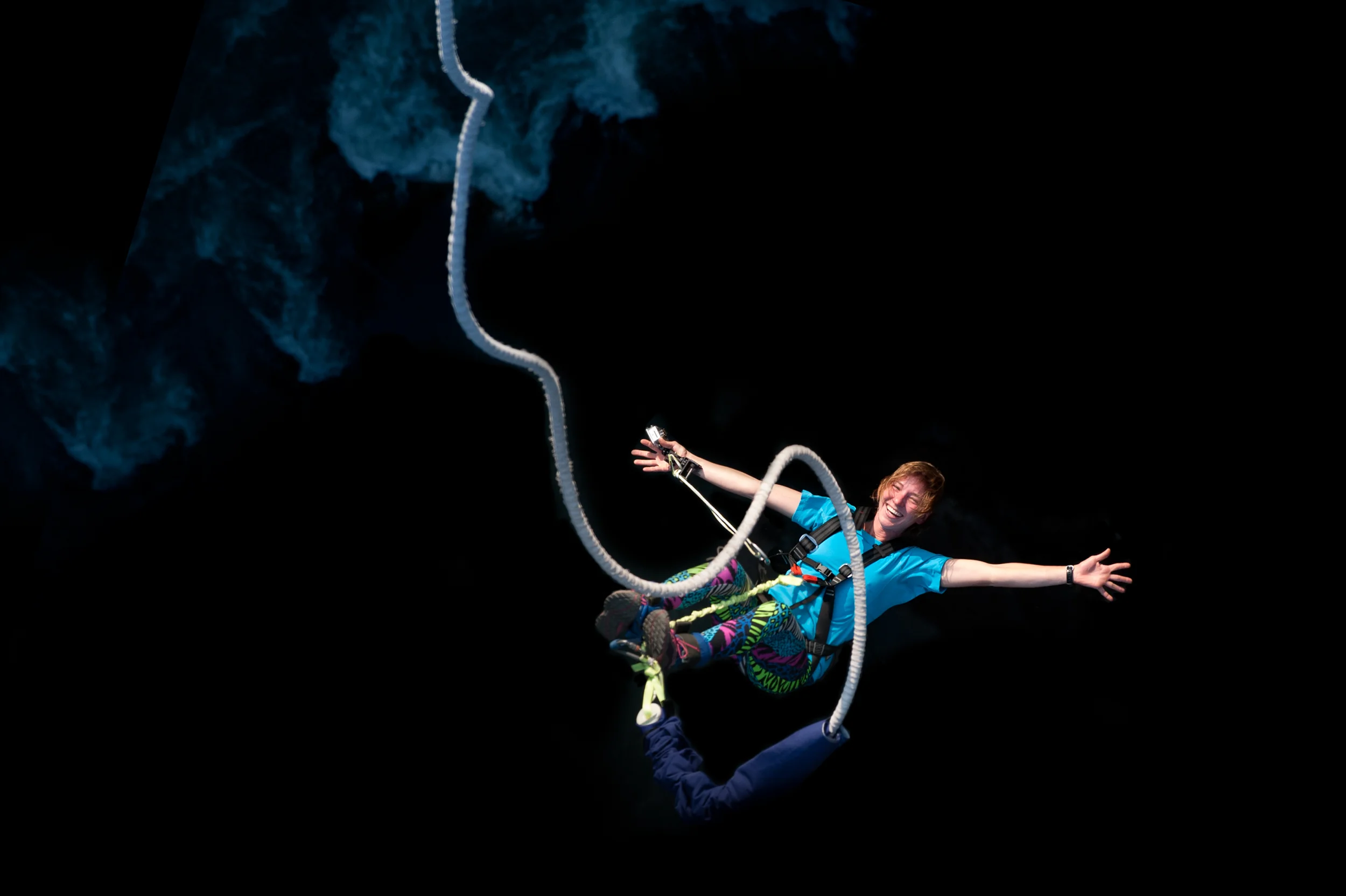 Nepal A girl smiles for the camera while bouncing back on a bungee jump at The Last Resort in Nepal