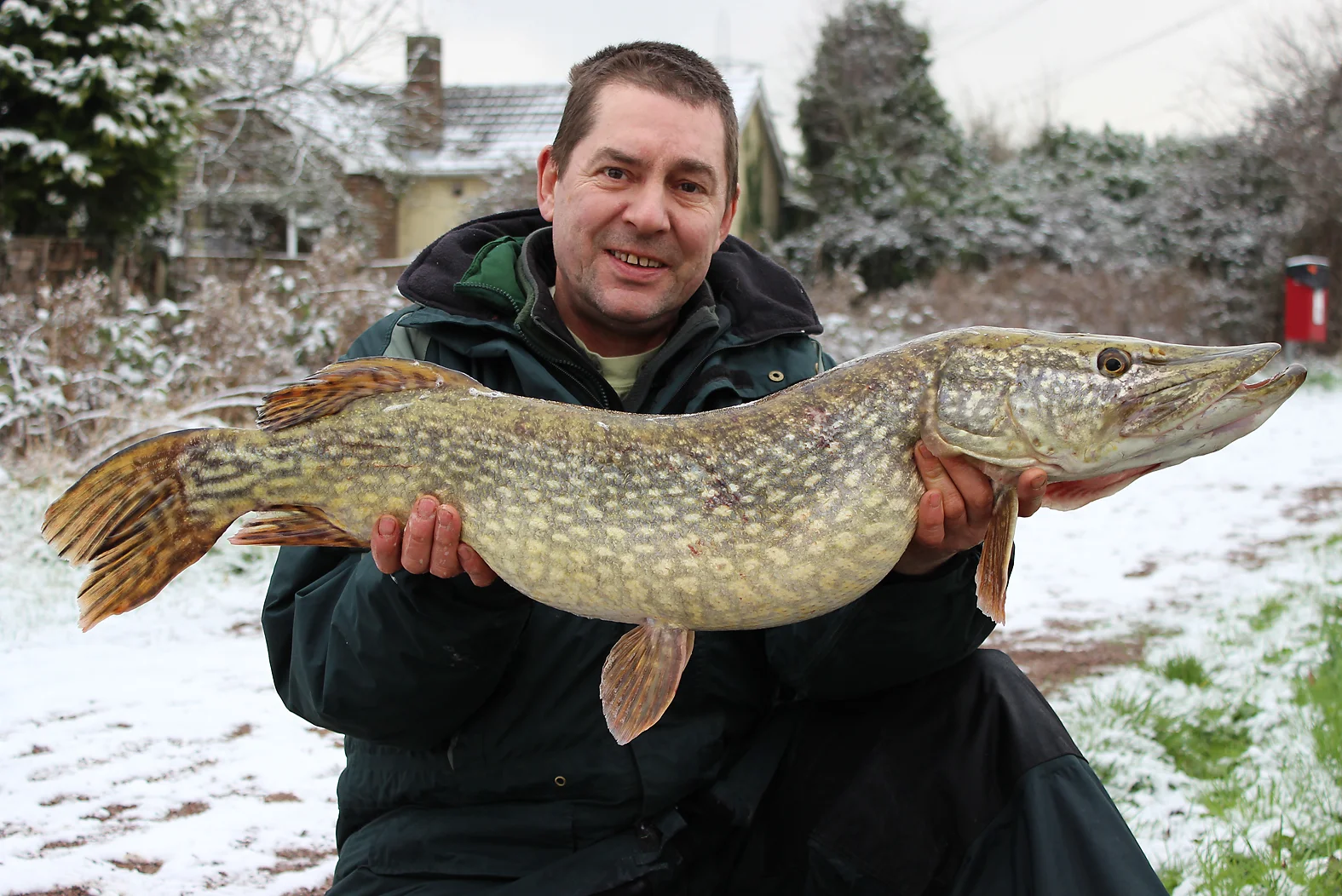 Now that's a snow fish! Gary with a 16lb'er