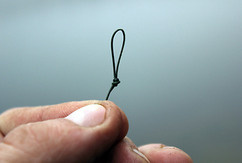5) Now tie a smaller loop in the other end of the hooklink, this is for attaching to the ring swivel on my lead clip system.