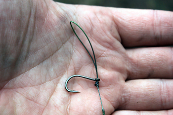 8) Thread the hook onto the loop as shown in the picture.