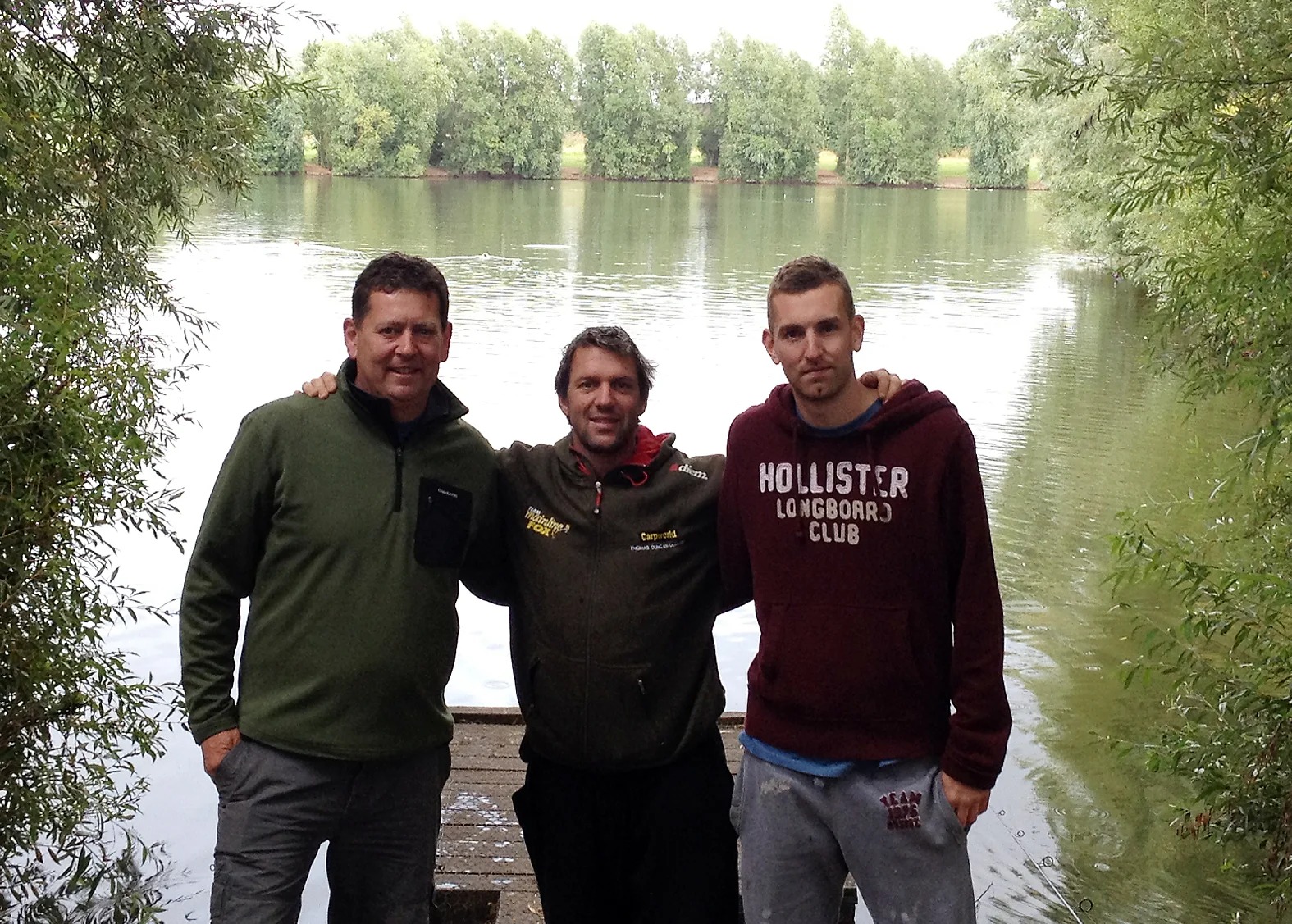 Tommy (centre), with Mark and Stuart, next to the lake at Thorpe Lea