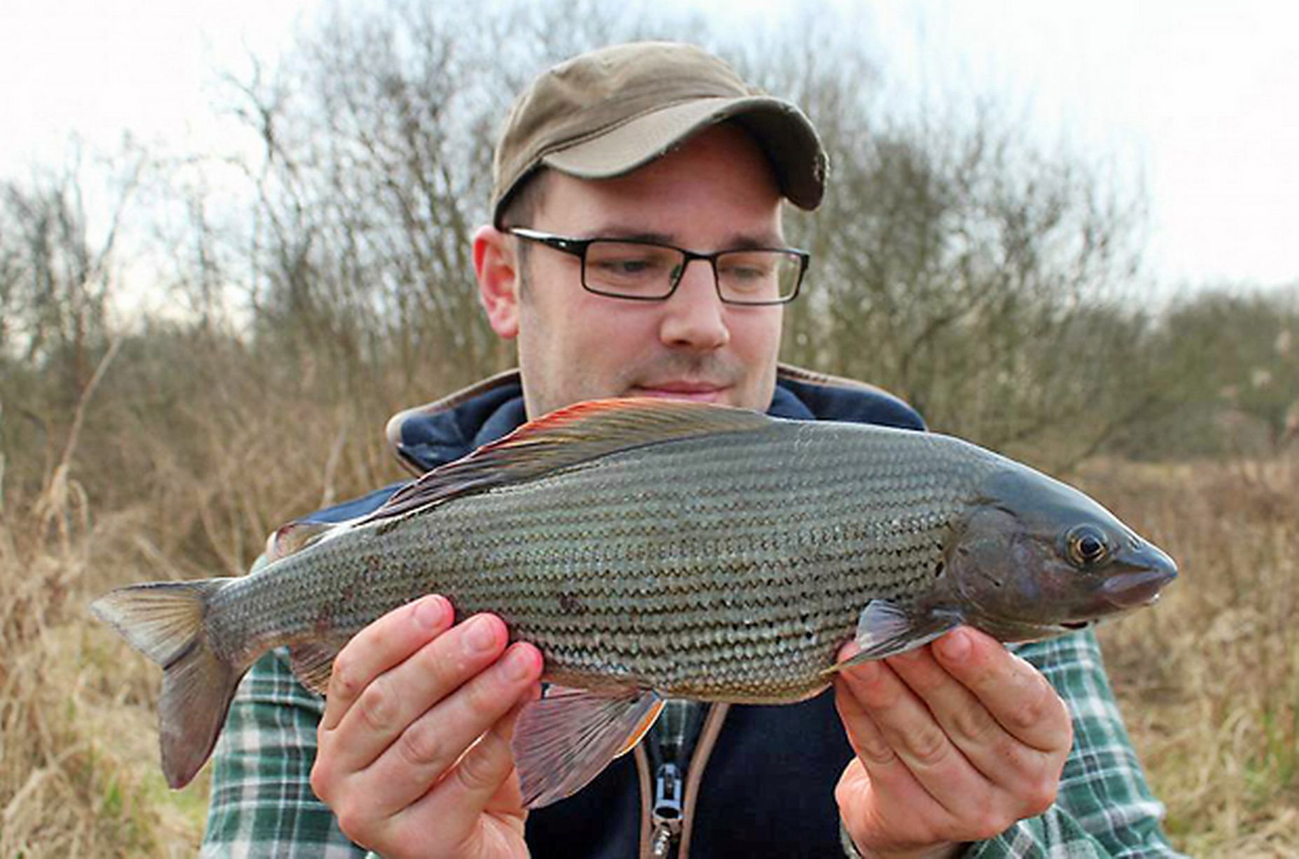 Darren Clarke with a 2.03 grayling