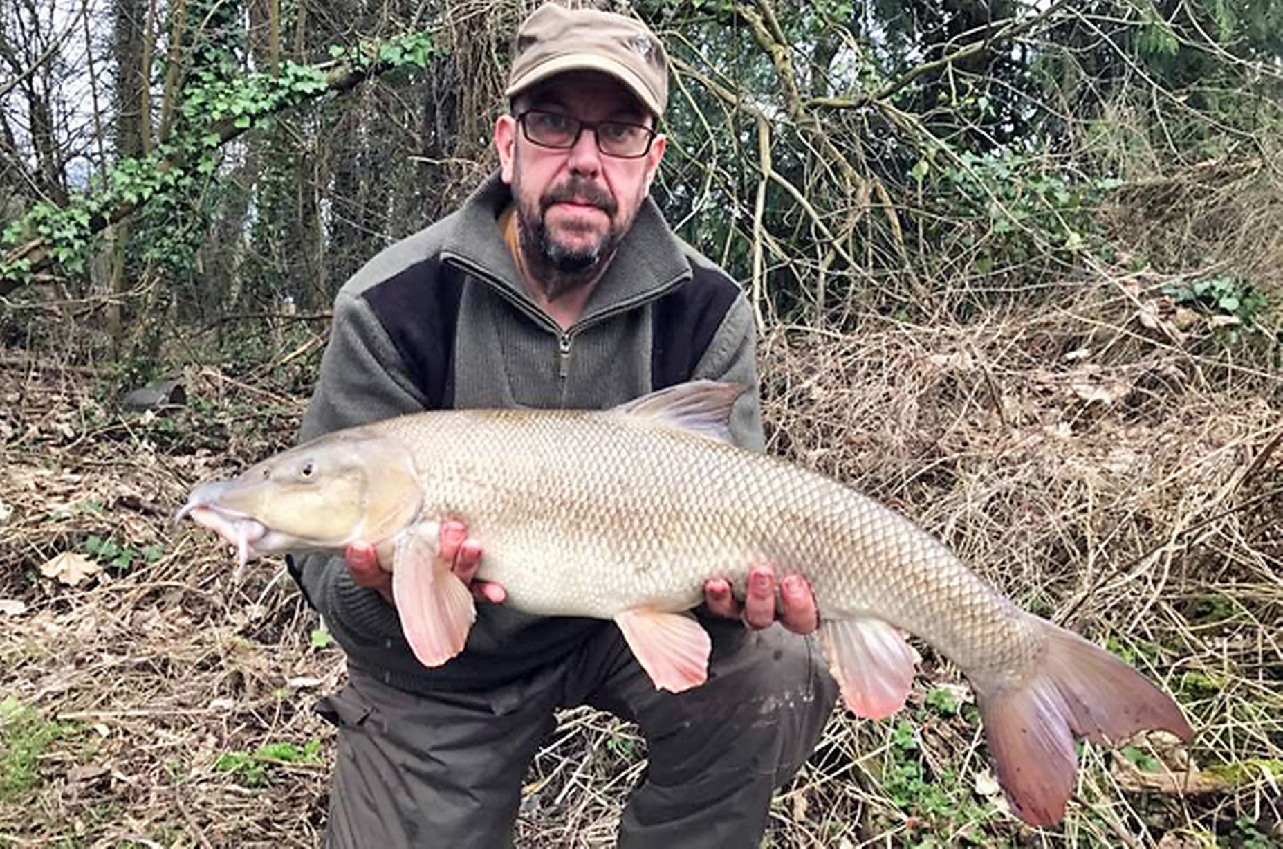 Lee Noakes shows off his new PB barbel at 12.10