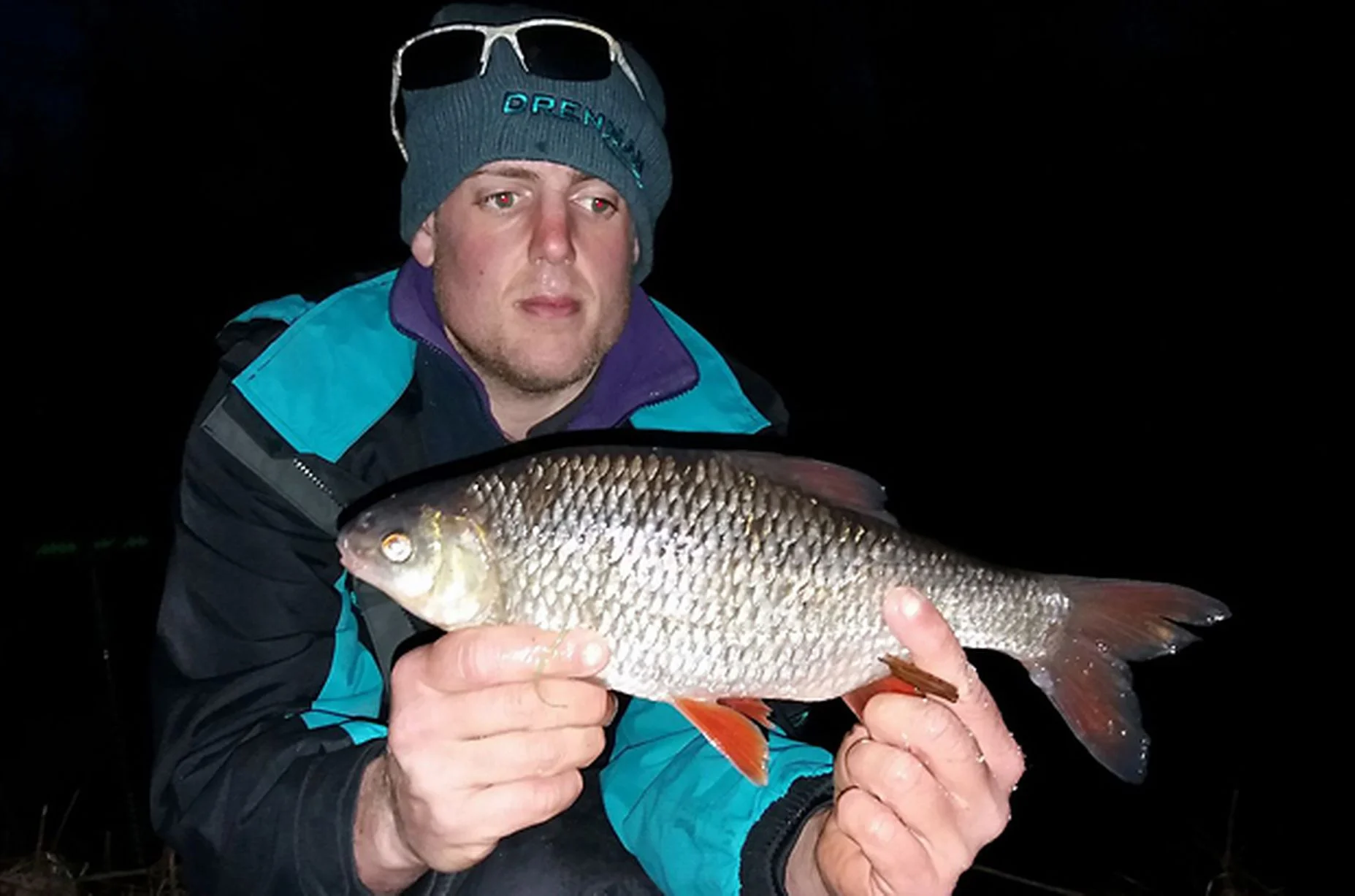 Joe Miller carefully holding a 1.10 roach