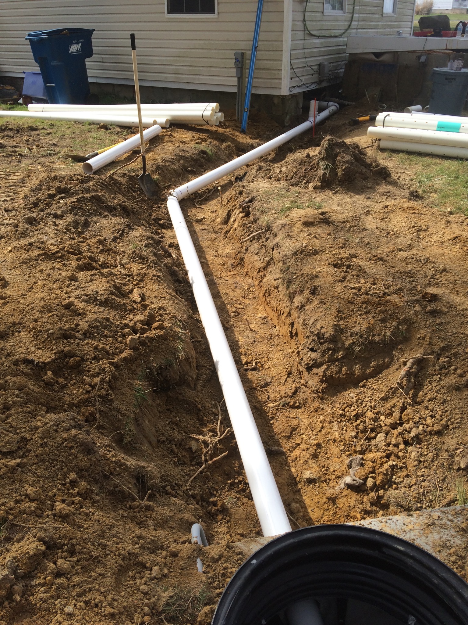Digging out septic plumbing | Shore Quality Contracting, LLC