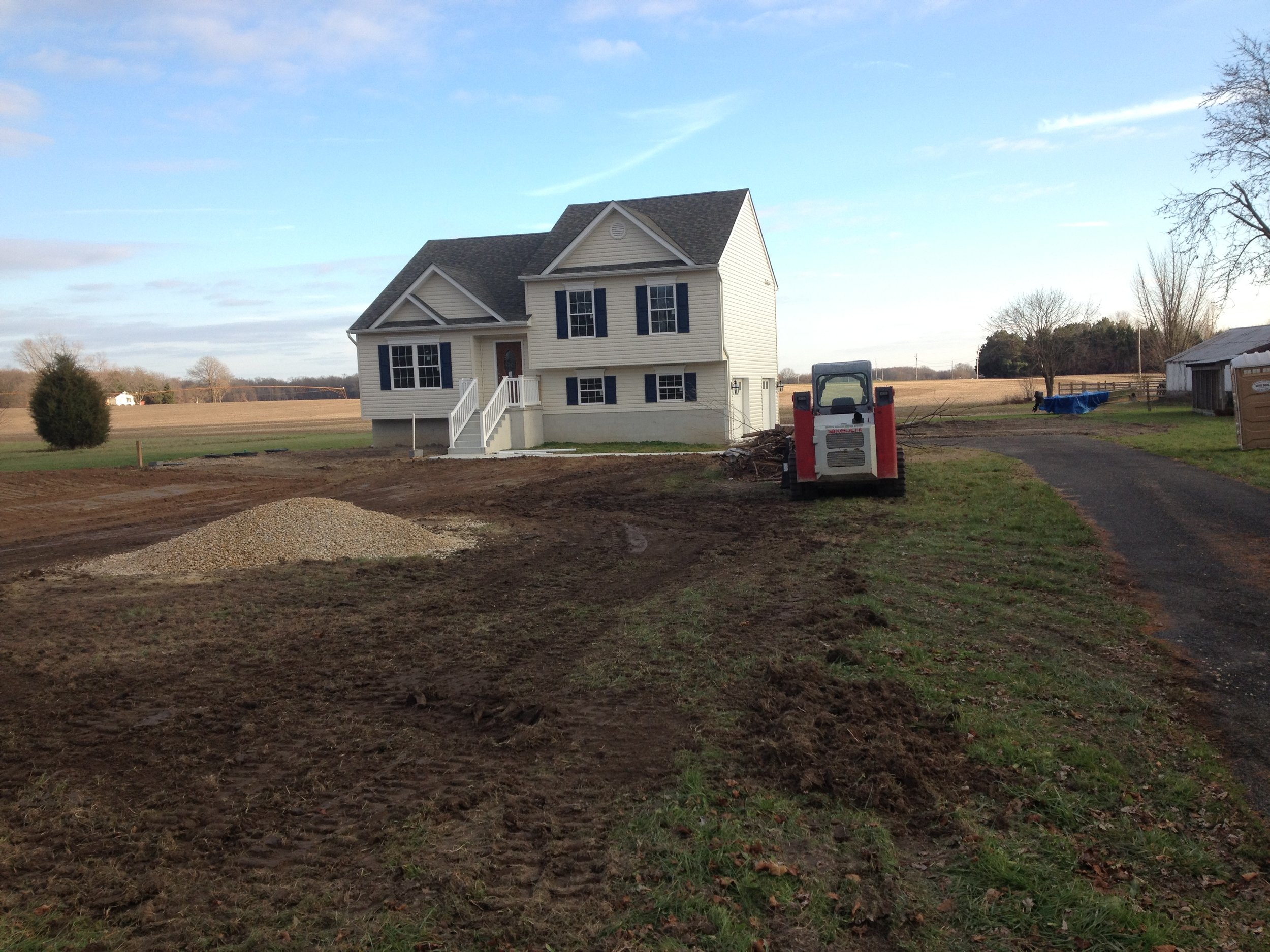 Grading yard after sand mound install | Shore Quality Contracting, LLC