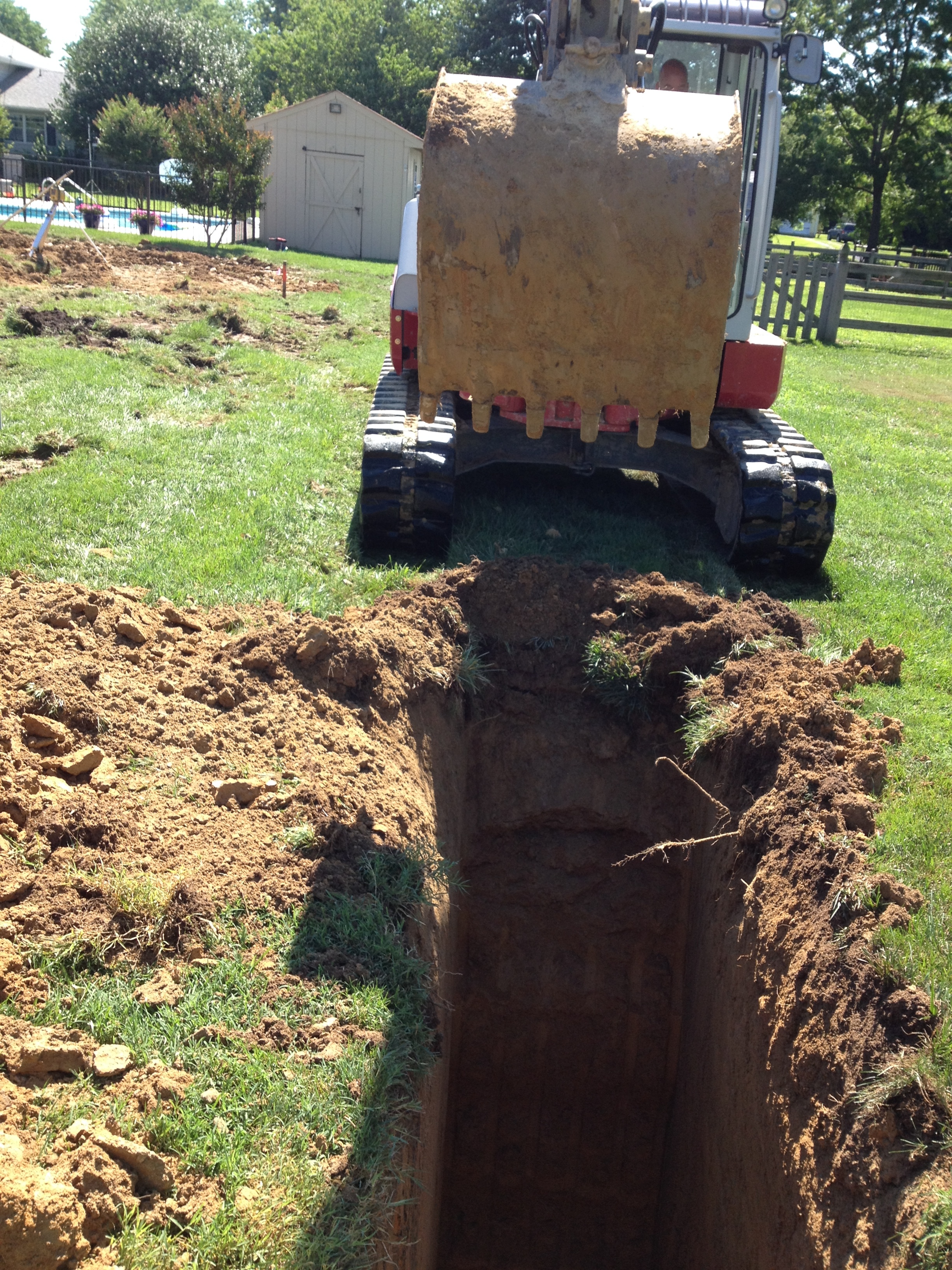 Excavating septic trench | Shore Quality Contracting, LLC