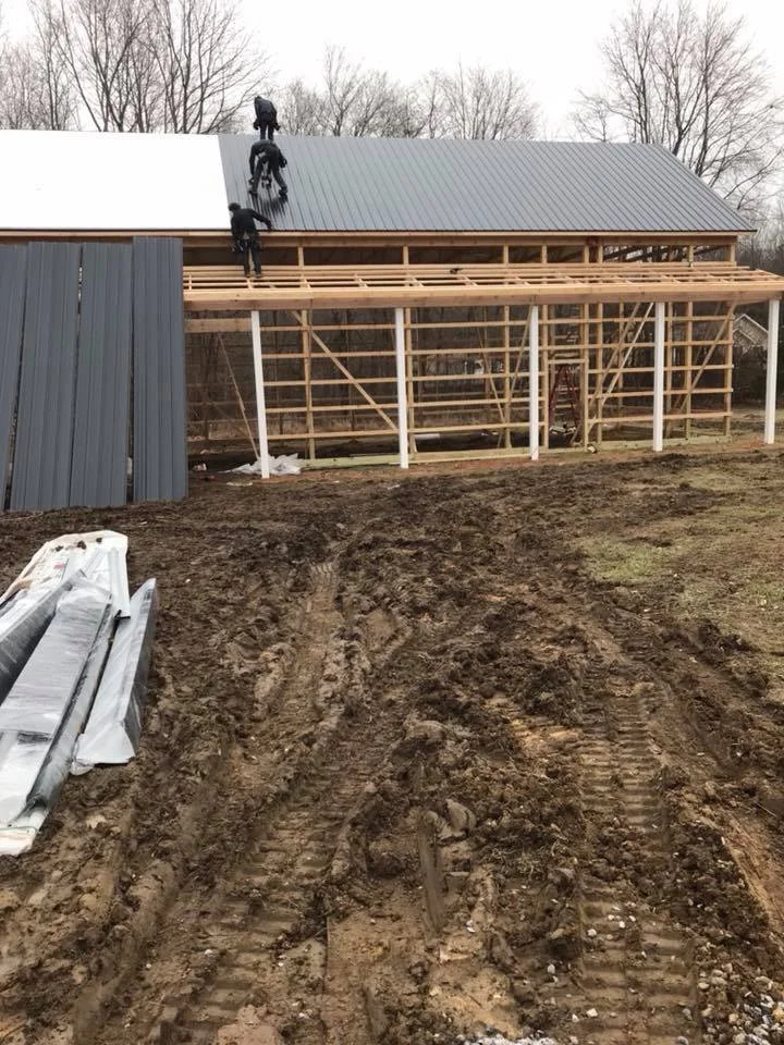 construction of pole building adding metal roof