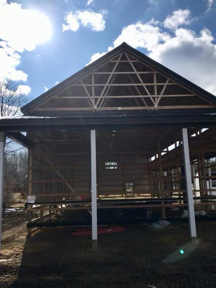 construction of pole building adding metal siding