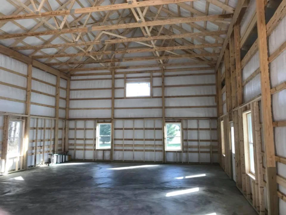 construction of pole building inside view of concrete floor