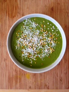 Match - Maca Green Smoothie topped with coconut flakes and bee pollen 