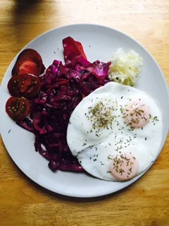 Typical breaky - three eggs, braised red cabbage, tomatoes, and of course kraut 