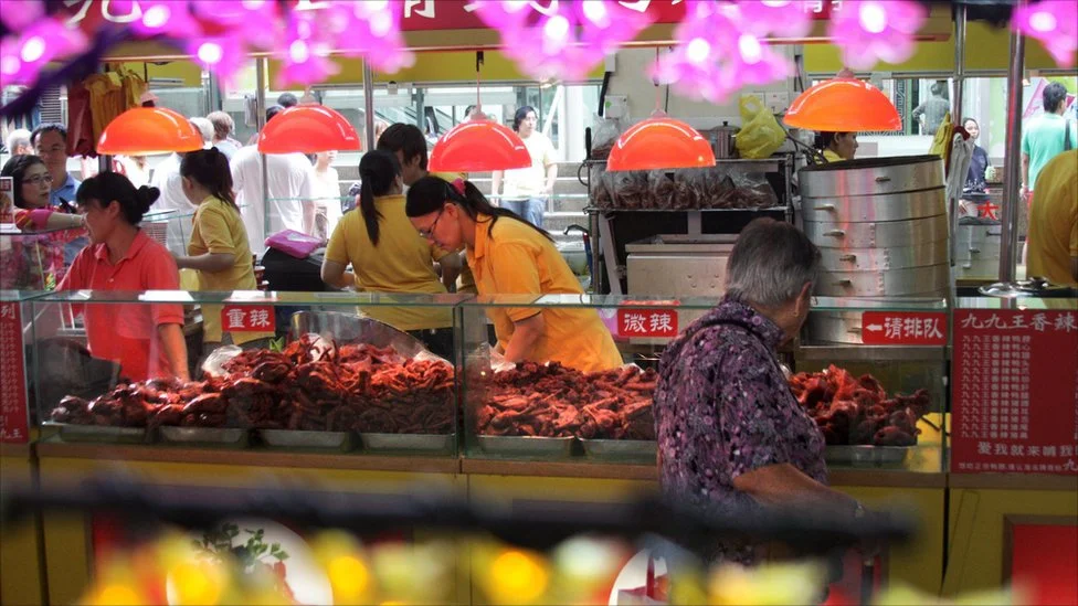 Inside a Singapore Hawker Centre. Foodable Web TV | Photo Credit: BBC News