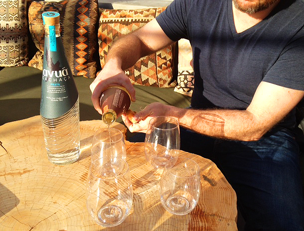 Nate Whitehouse pours the spirit at Avuá's launch party. | Foodable WebTV Network