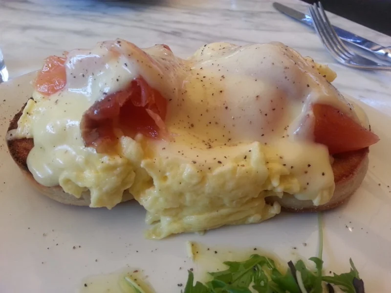 Soft scrambled eggs with hot smoked ocean trout, hollandaise and house made english muffin at Eveleigh | Foodable WebTV Network