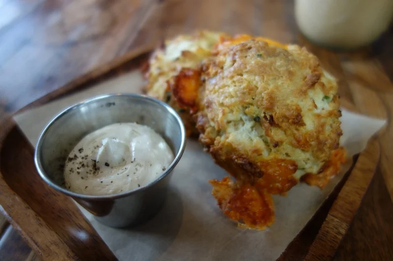 Bacon cheddar buttermilk biscuits with maple butter at M.B. Post | Foodable WebTV Network