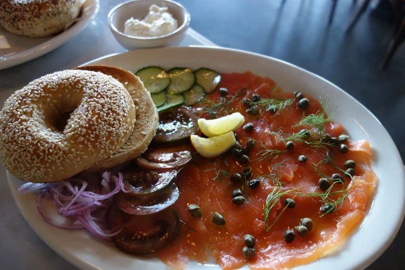 Bagel, lox and cream cheese with tomato, red onion, capers and cucumber at Scopa | Foodable WebTV Network