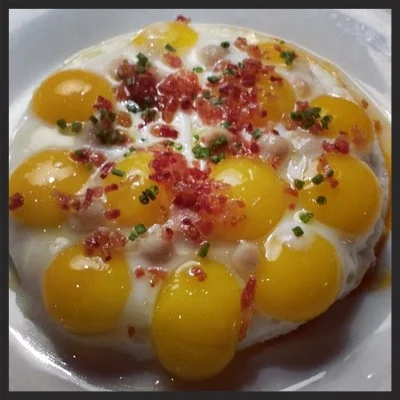 12 Quail Eggs Sunny Side Up at Tres L.A. | CREDIT: Yelp, Lily Y.