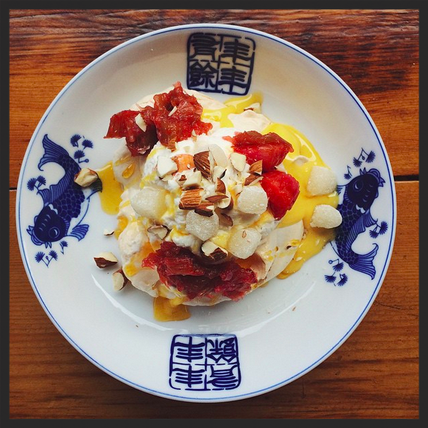 Rhubarb pavlova, ginger rhubarb compote, orange curd, maple whip & mochi at Mei Mei. | Credit: Instagram, meimeiboston