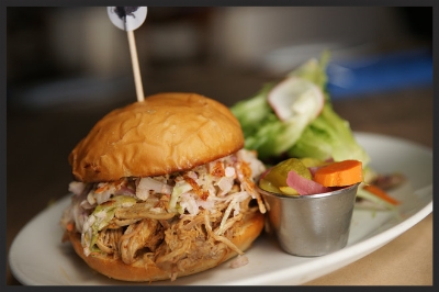 All-natural pulled whole hog BBQ sandwich, NC Style from SMOKE | Credit: SMOKE