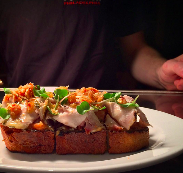 Porchetta on toast with peach mustard & crispy skin | Credit: Instagram @vernickphilly