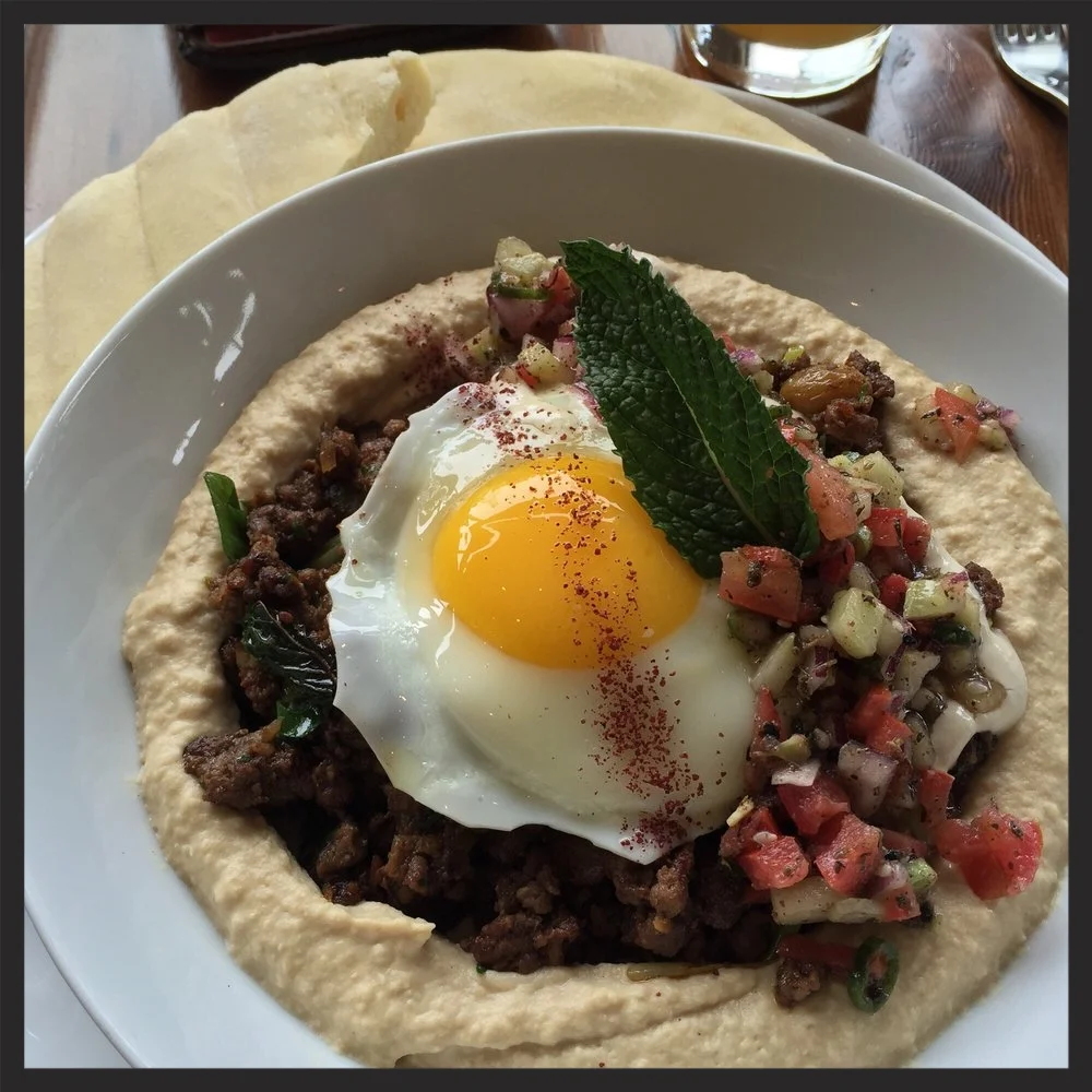 Hummus with spicy lamb, served with an egg on top | Yelp, Rudrajit D.